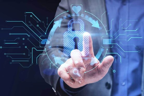 Conceptual image of cybersecurity with a hand interacting with a digital lock and circuit board interface