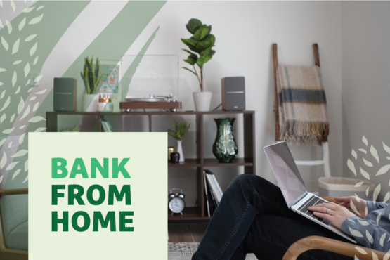 Person sitting in a chair in a living room working on a laptop with "Bank from Home" text overlayed