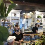 Young female waitress taking a customer's order at a restaurant