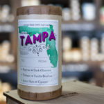 Candle with label that states "Tampa"