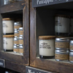 Candles on shelf at apothecary store