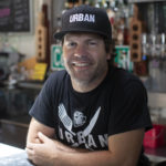 Restaurant worker posing and smiling for camera