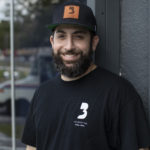 Portrait of man with beard posing for camera