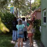 Line of customers wrapped alongside buildings