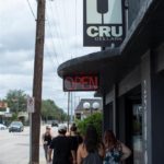 Line of customers waiting to get into Cru Cellars