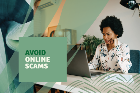 "Avoid Online Scams" text over image of a woman sitting at a desk working on a laptop