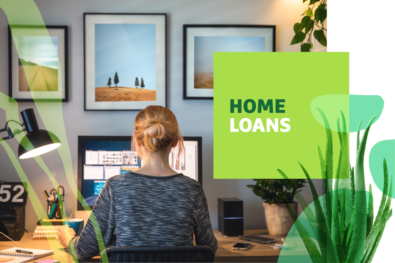 "Home Loans" text over image of a woman sitting at a desk working on a computer