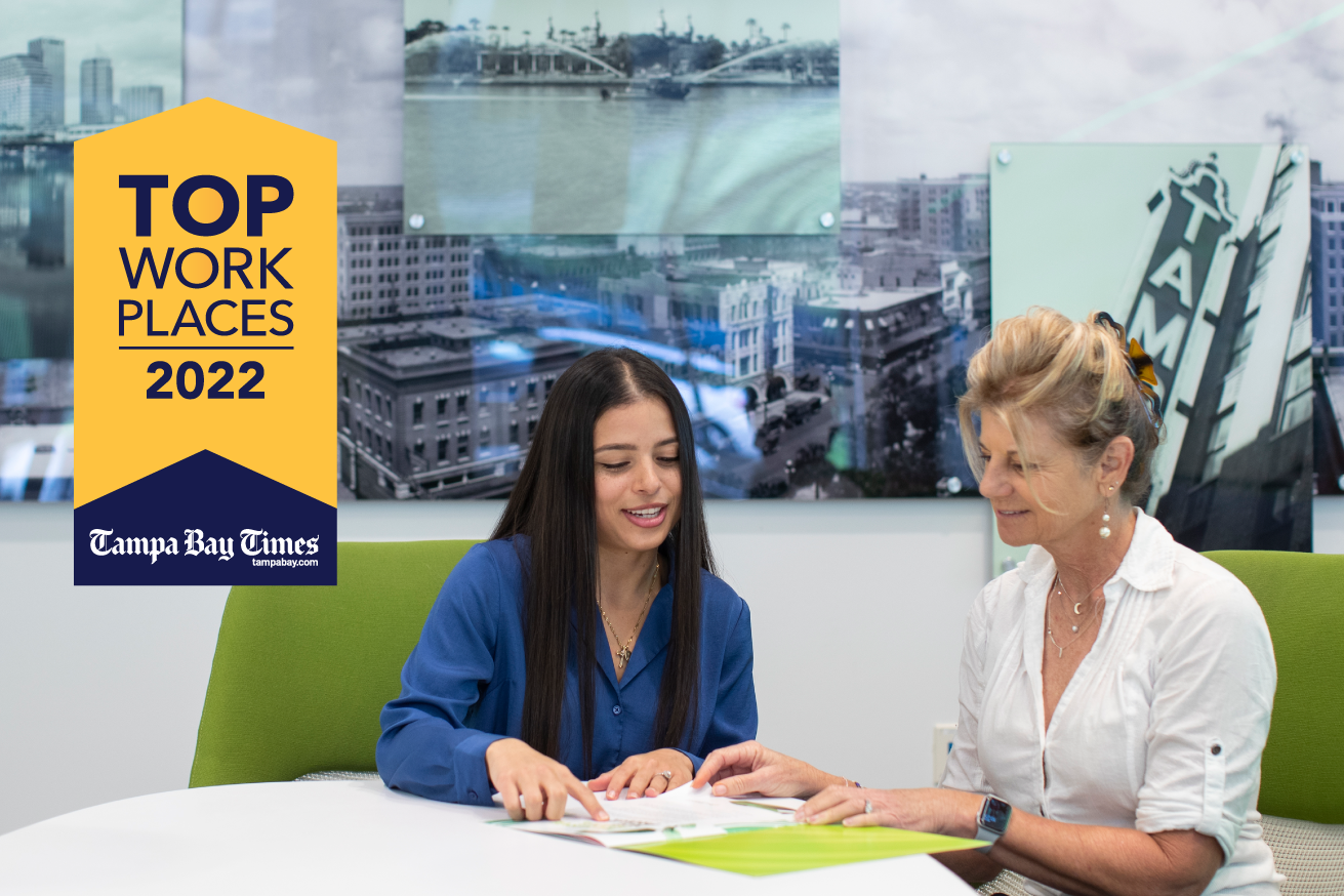 "Top Workplaces 2022" text over image of Grow team members working at a table