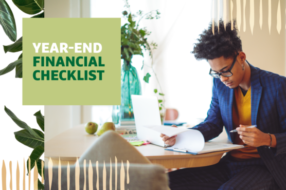 Person wearing glasses sits at a table looking through papers with "Year-end Financial Checklist" text overlayed on the top left