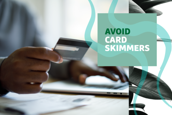 Hand holding a credit card with "Avoid Card Skimmers" text overlayed