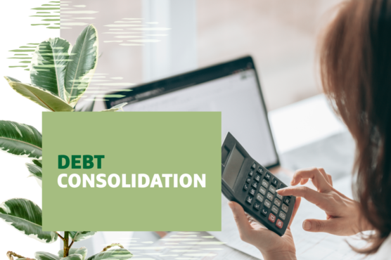 Woman sits at in front of a laptop using a calculator with "Debt Consolidation" text overlayed.