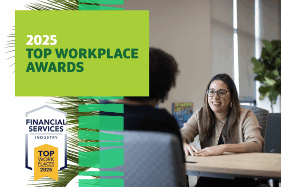 Two individuals in an office setting, one smiling and seated across from the other, with a graphic overlay reading "2025 Top Workplace Awards" and a badge stating "Financial Services Industry Top Work Places 2025".